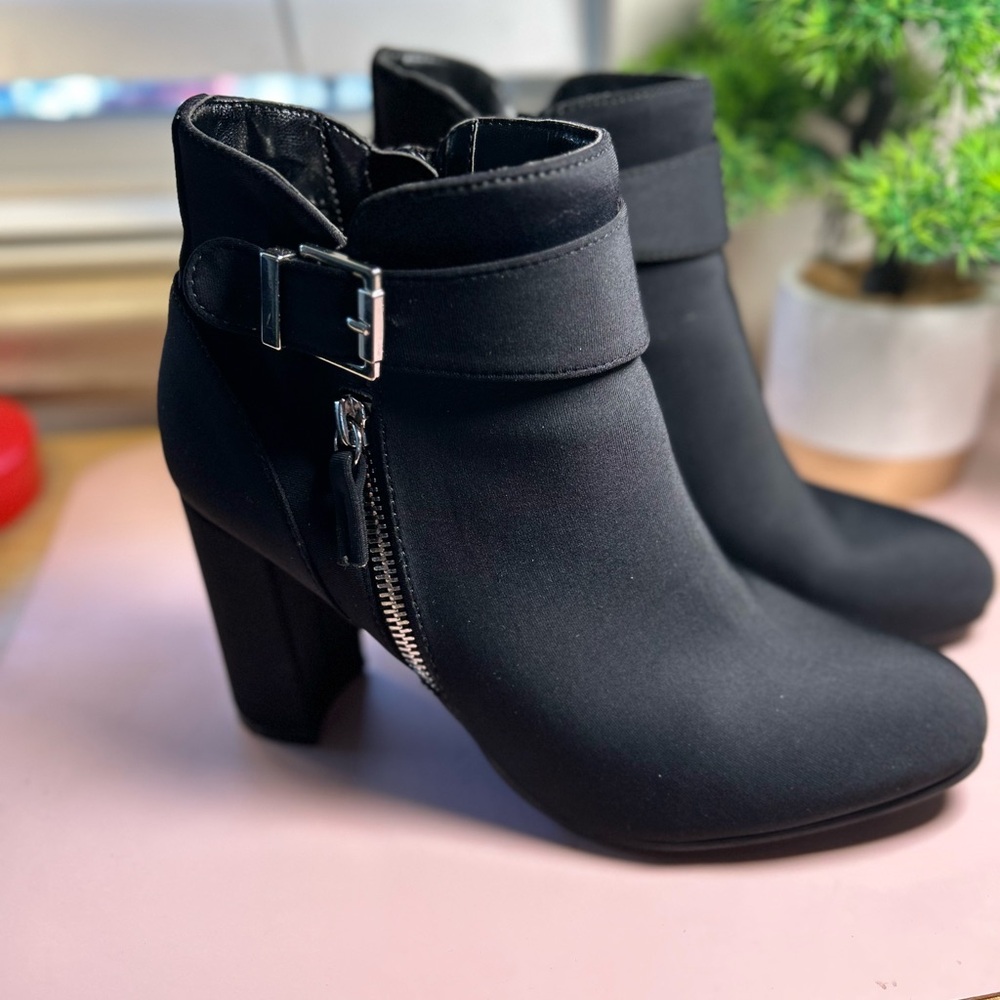 Black ankle booties with chunky heel and side zipper